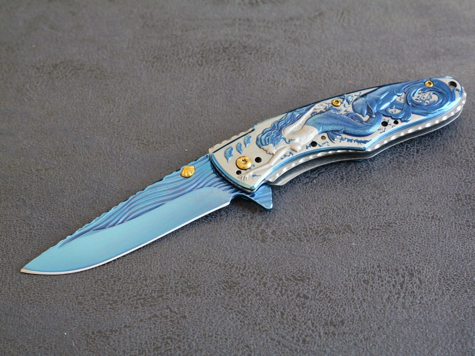 Browning EXT-2010-C Deniz Kızı İşlemeli Kabze Otomatik Kamp Çakısı Browning EXT-2010-C Deniz Kızı İşlemeli Kabze Otomatik Kamp Çakısı